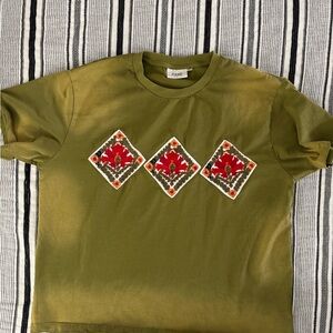 Purchased from FREE PEOPLE, Nice quality slightly over-sized t-shirt.